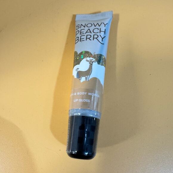 Lip gloss / Bath and Body Works Snowy Peach Berry Lip Gloss NWT - Picture 1 of 2